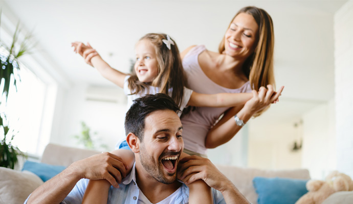 a happy family in a room with excellent indoor air quality