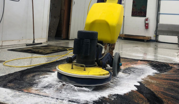 Rug cleaning using equipment